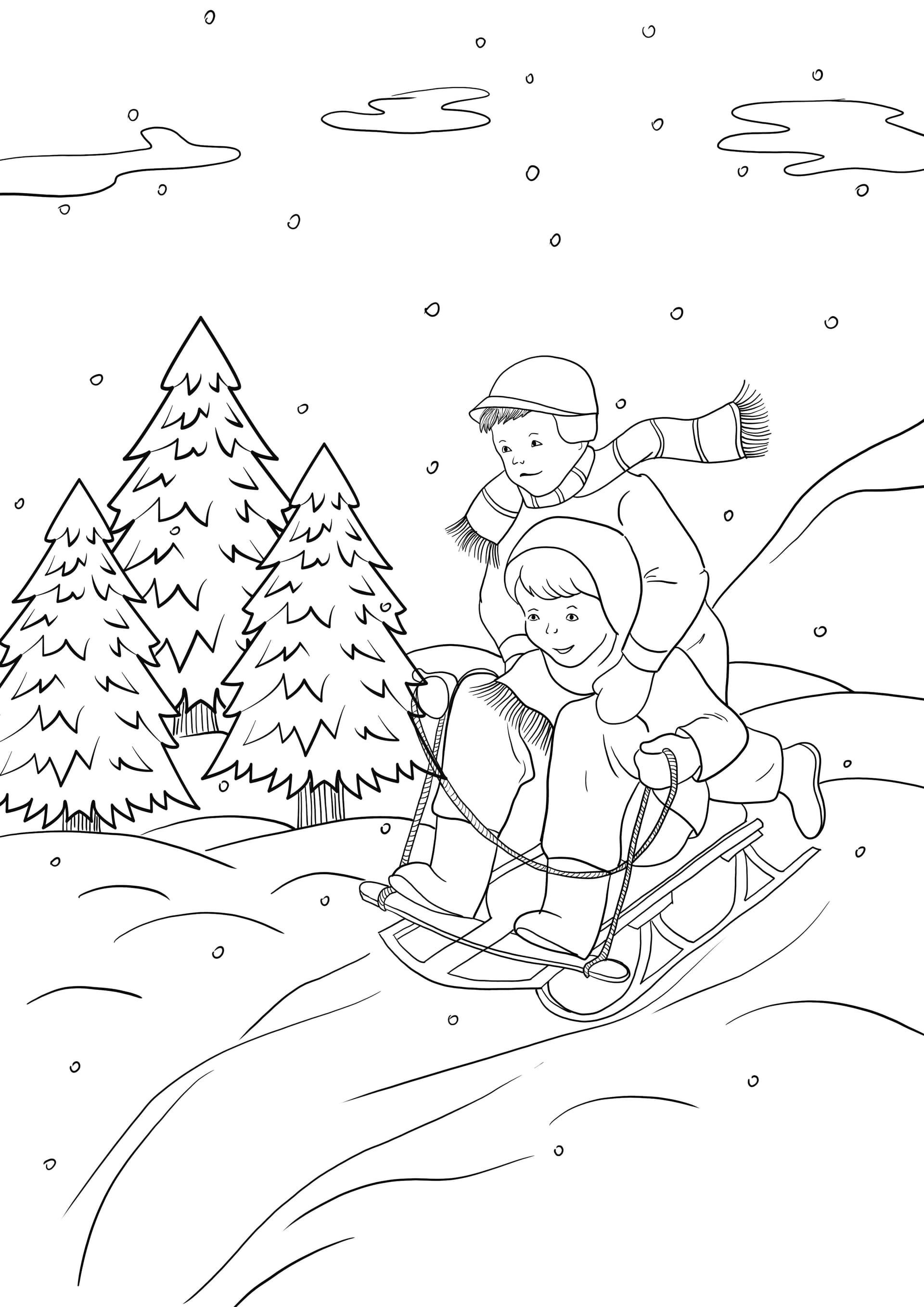 boys sledging on a hill